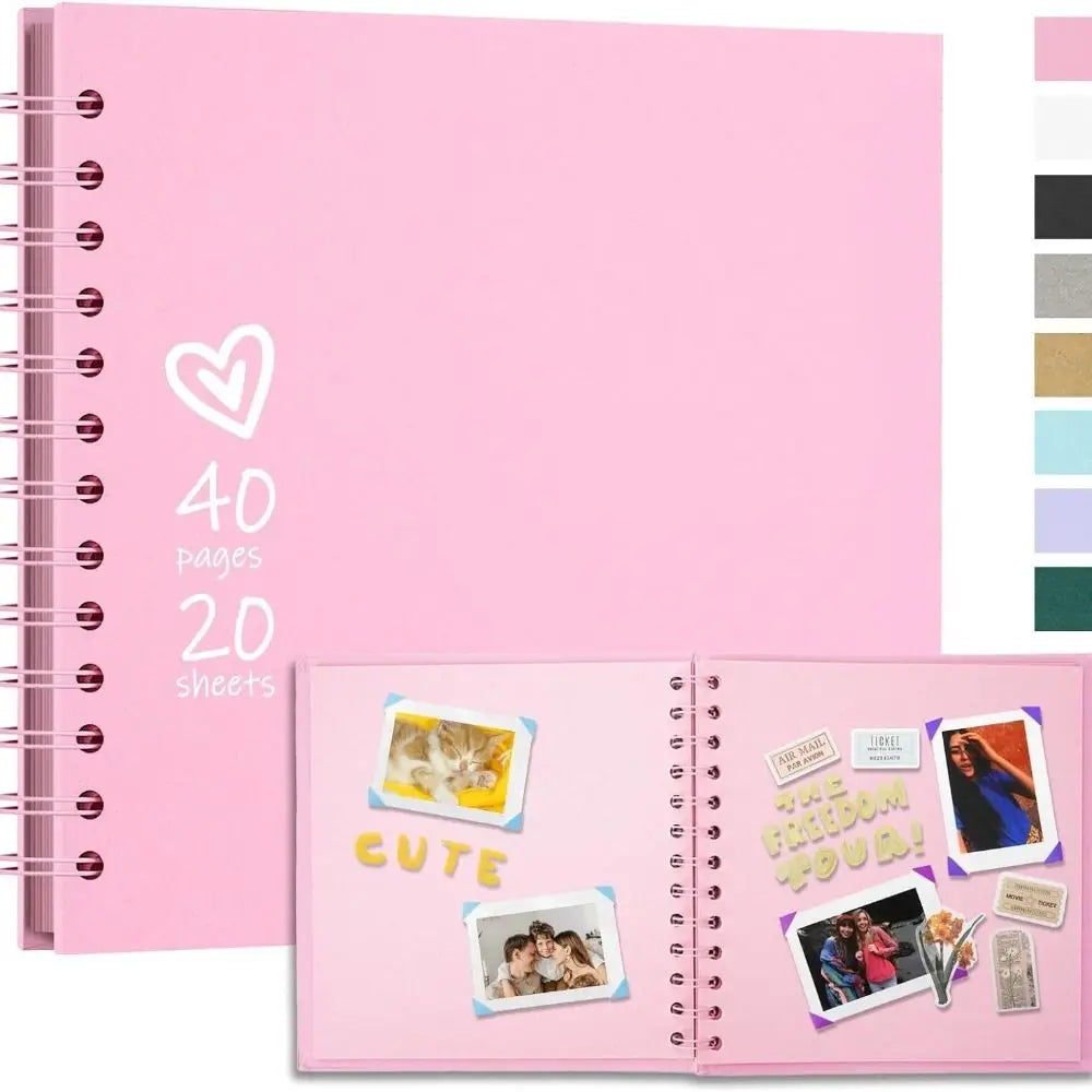 A pink spiral-bound scrapbook with 40 pages and 20 sheets, featuring decorative paper inserts.