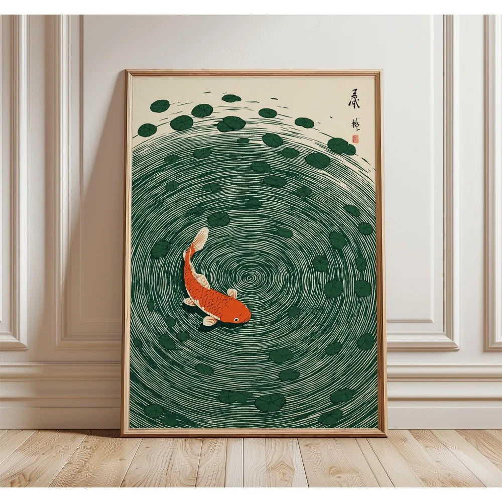 A framed canvas print featuring a green and white circular pattern with an orange fish in the center.