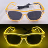 Pair of yellow LED wire party glasses with dark lenses displayed against a white background.