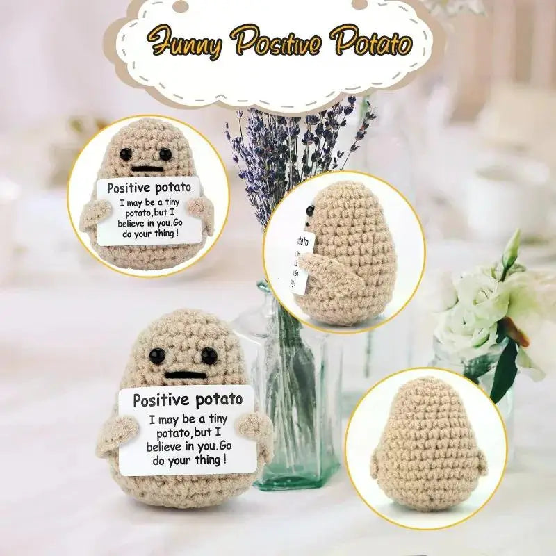 A handmade knitted plush potato doll with a stitched face and expression.