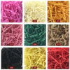 A grid of colorful crinkle cut paper shreds in various shades including pink, yellow, orange, green, and brown.