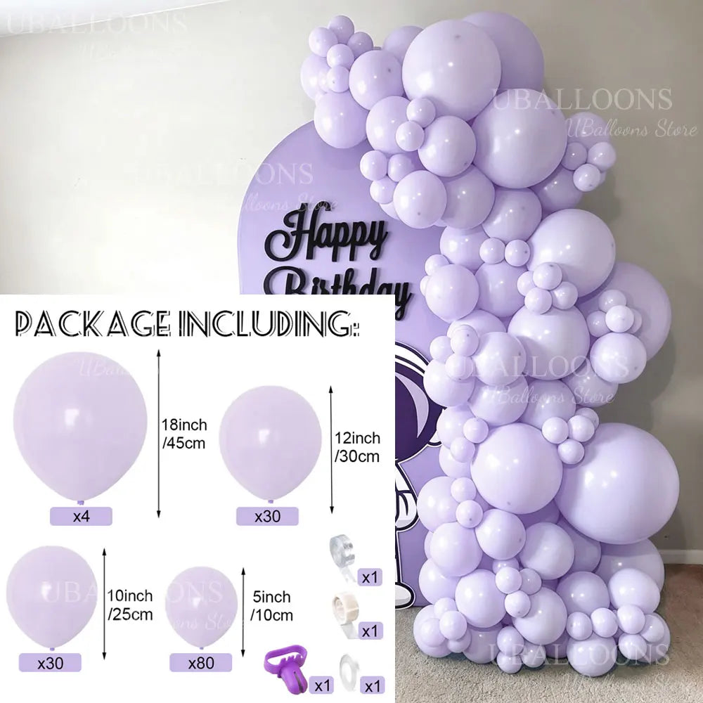 A large purple balloon arch display featuring numerous light purple balloons and various accessories for parties.