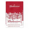 A vintage red metal sign for Budweiser featuring the King of Beers logo and text.