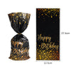A vertical display featuring a black background with gold confetti and the text Happy Birthday in elegant gold script.
