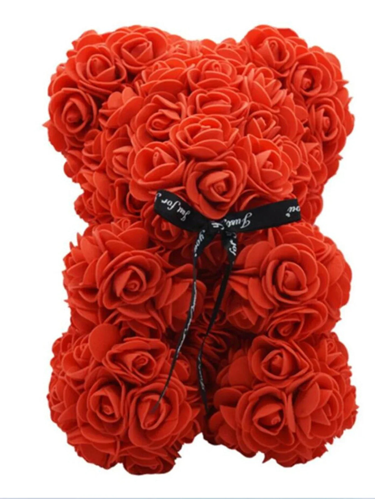 Künstlicher Rosen-Teddybär in leuchtend orange Farbe.