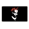 A black banner featuring a red dripping text and a white face silhouette.