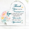 A clear acrylic heart-shaped sign with blue script text that reads Thank You for the amazing person you are for all that you 