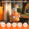 A white goose costume dress with an orange floral pattern displayed outdoors near a doorway.