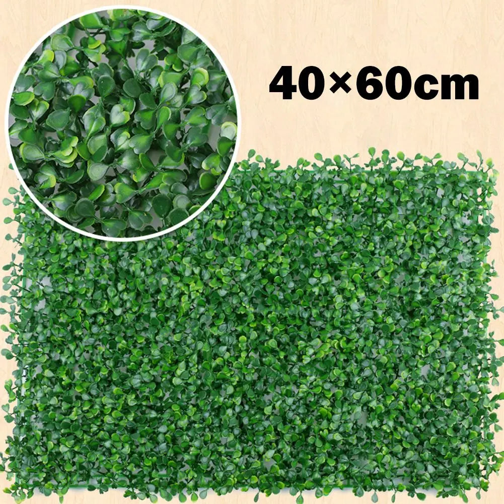 Green artificial grass hedge panels measuring 40x60cm for privacy and decor.
