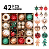 A collection of 42 shatterproof Christmas ball ornaments in various colors and finishes displayed in a wooden tray.