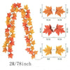 A long artificial vine featuring orange and red maple leaves used for decoration.