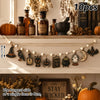 Vintage wooden Halloween flag set featuring pumpkins, ghosts, and moons displayed on a shelf.