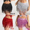 A collection of hula dancer layer sequins skirts in black, white, red, and pink with tassel belts.