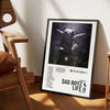 A framed canvas wall art featuring an angel with wings against a dark background.