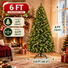 A tall artificial Christmas tree is displayed in a living room setting, next to a fireplace and window.