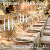 Elegant wedding tables decorated with tall white taper candles and greenery for romance and elegance