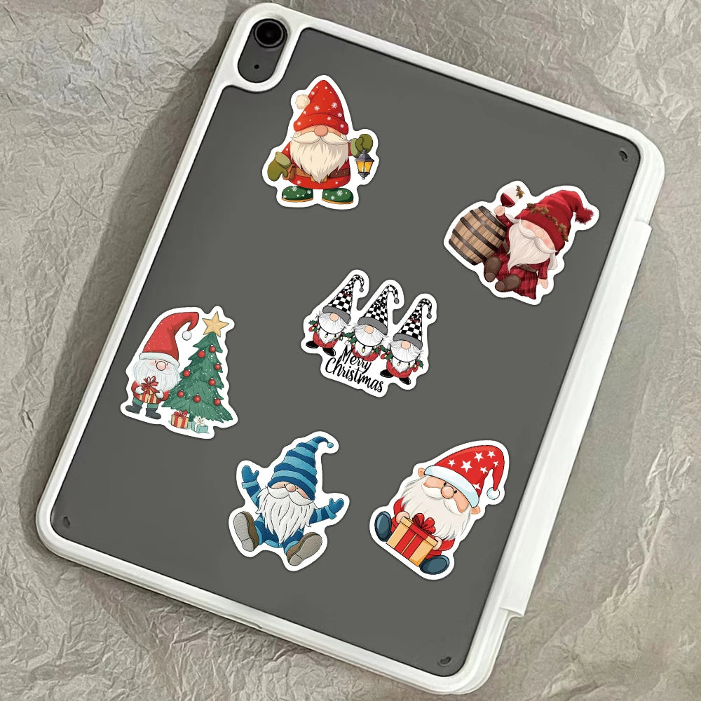 A tablet displaying a pack of Christmas dwarf stickers featuring Santa and festive decorations.