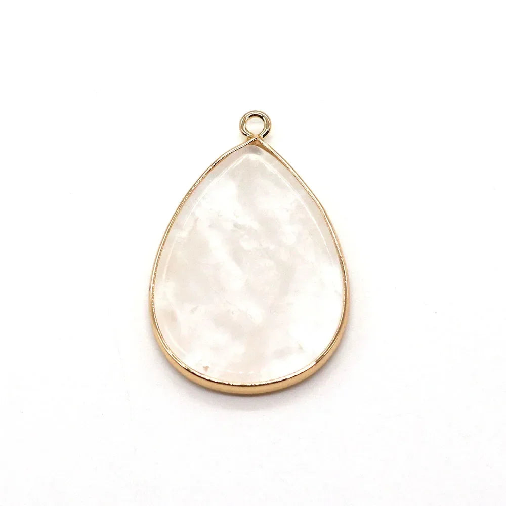 A teardrop-shaped natural agate and rose quartz pendant charm with a gold-toned bail.