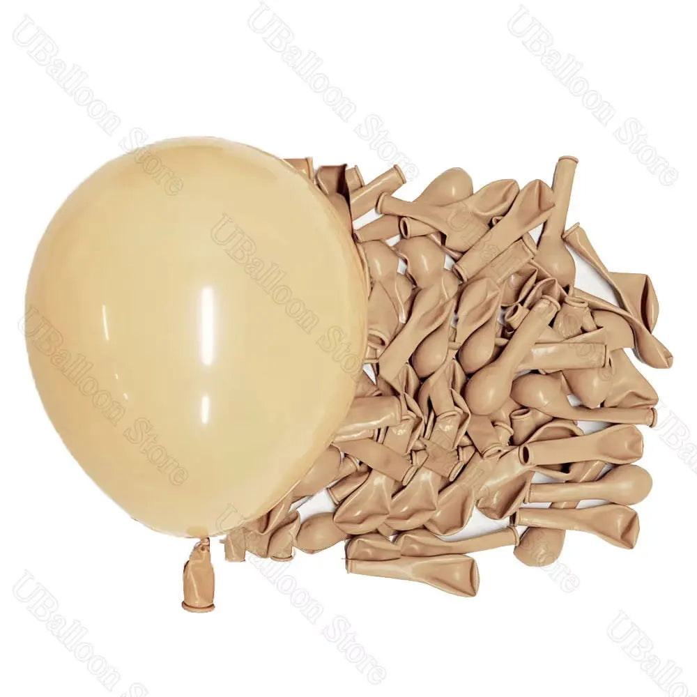 A cluster of tan latex balloons and one large beige balloon for baby shower or birthday décor.