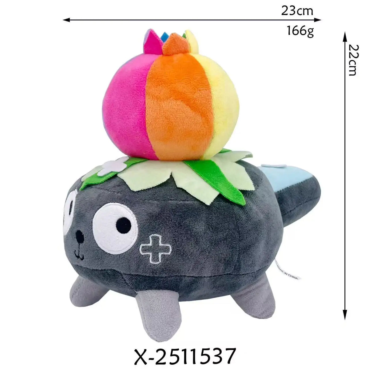 A plush toy resembling a black animal with large eyes and a colorful, fluffy head.