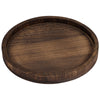 A round, dark brown wooden serving tray with a natural grain finish.