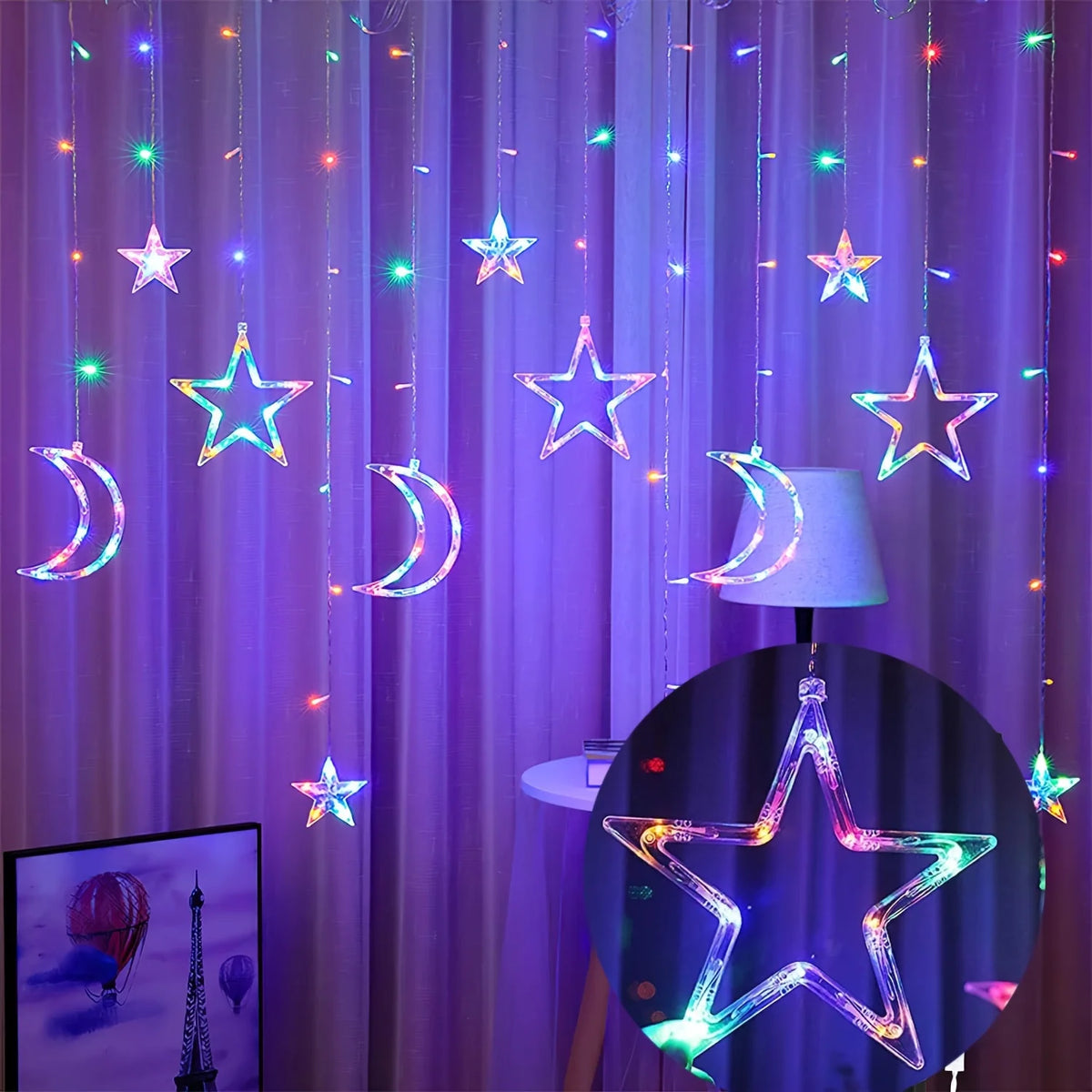 String lights featuring stars and moons hang in front of purple curtains, illuminating a decorative light fixture.