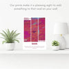 A poster featuring a vibrant pink and purple abstract design with the text We're all alone in this together