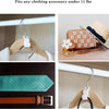 A set of space-saving cascading hanger connectors and hooks used for wardrobe organization.