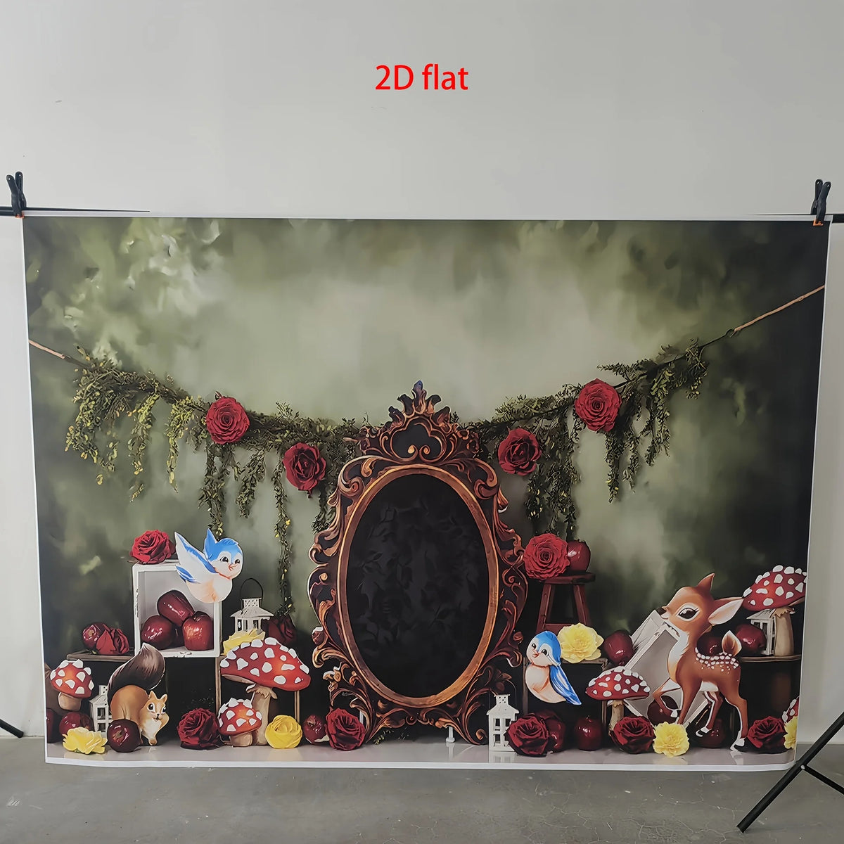 A flat 2D birthday banner featuring a dark wreath of roses and greenery with small animal figures.