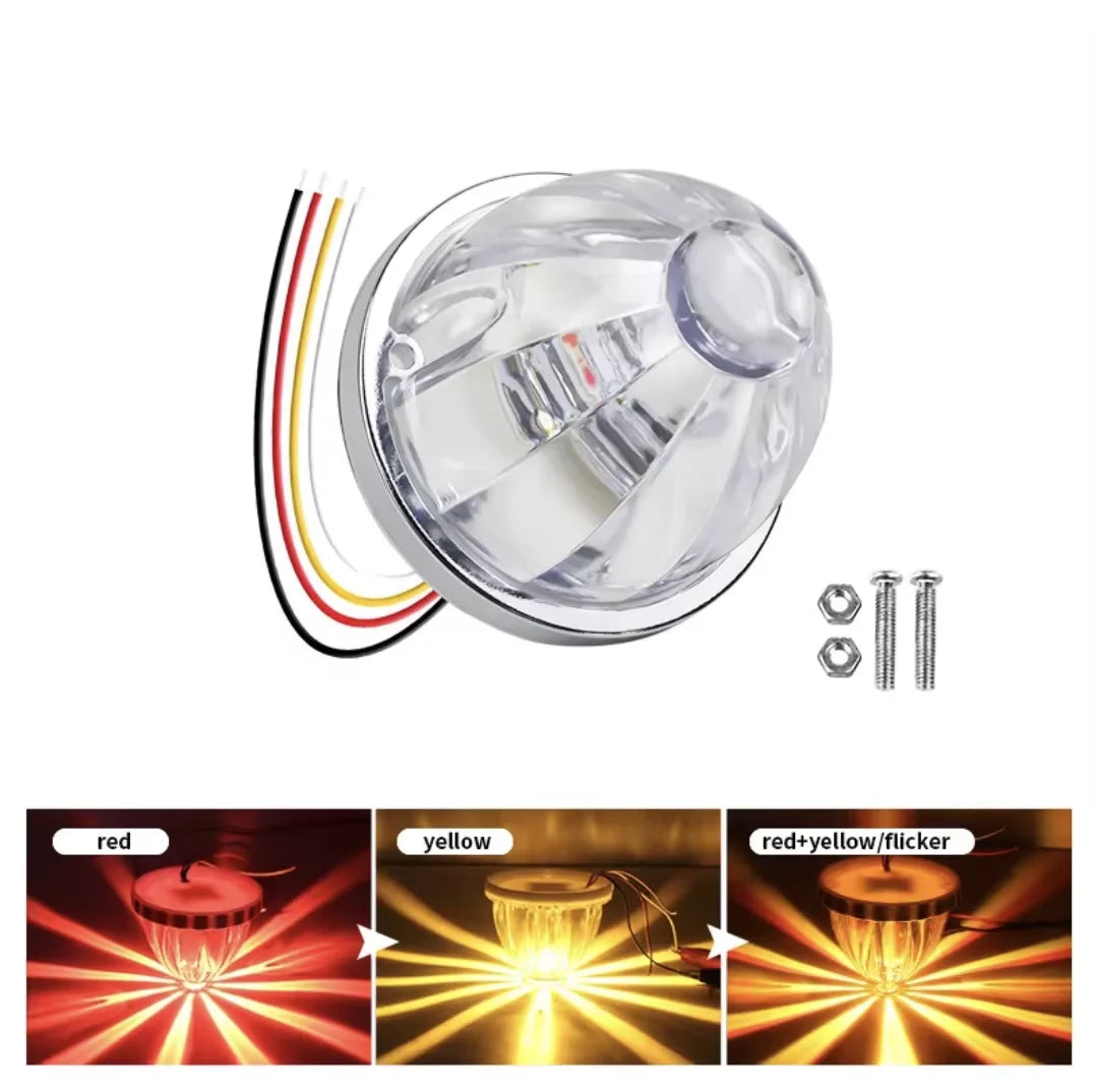 A clear plastic LED side marker light assembly with wires and mounting hardware.