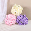 A set of two bouquets of lifelike foam roses in pale yellow and lavender colors.