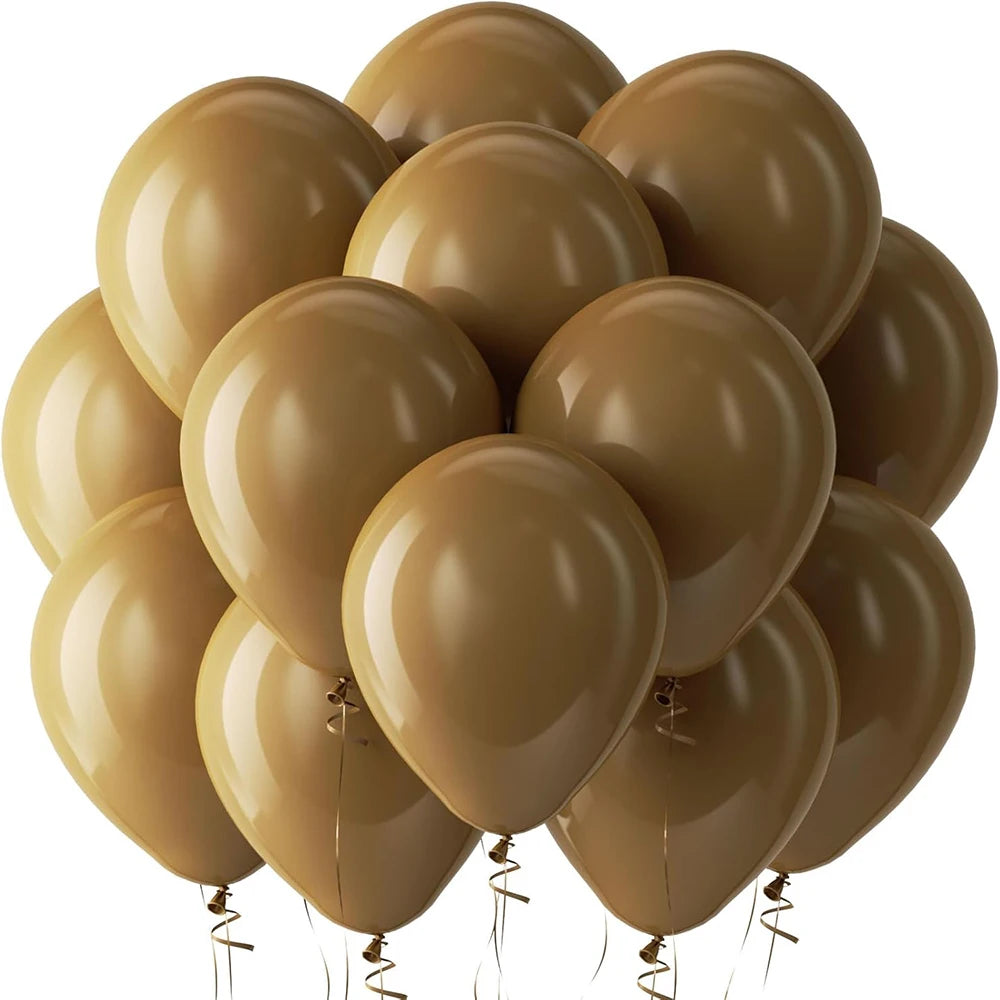 A cluster of tan and gold latex balloons tied together for a celebration