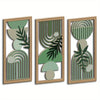 Three framed pieces of boho wood leaf wall art featuring geometric patterns in muted green and beige tones