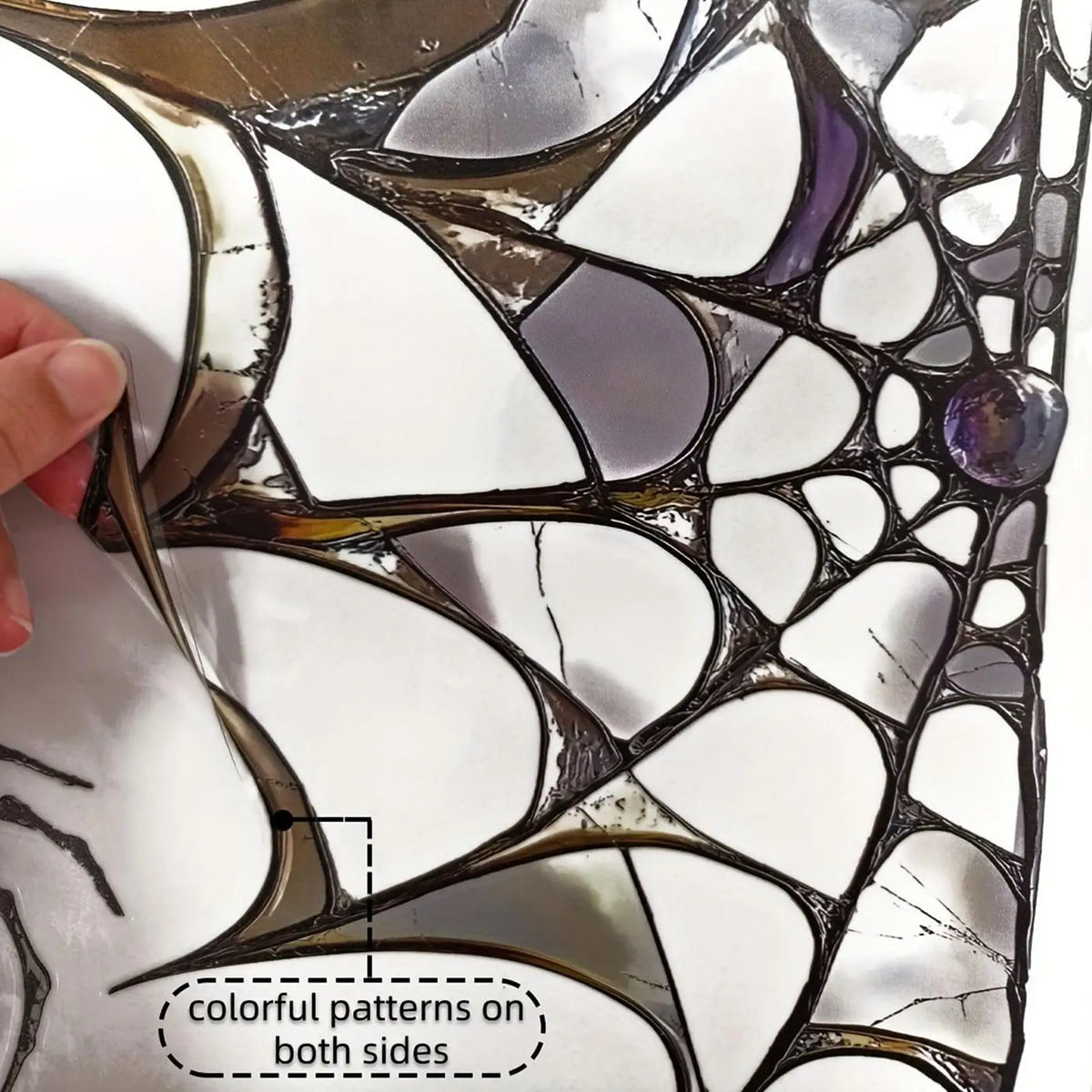 Halloween spider web window decals featuring colorful patterns on both sides