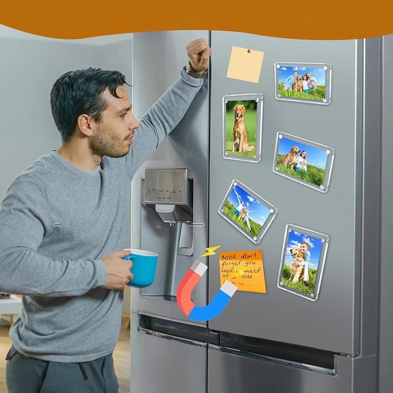 A man is using 3-piece photo clips to decorate the interior of a refrigerator door.
