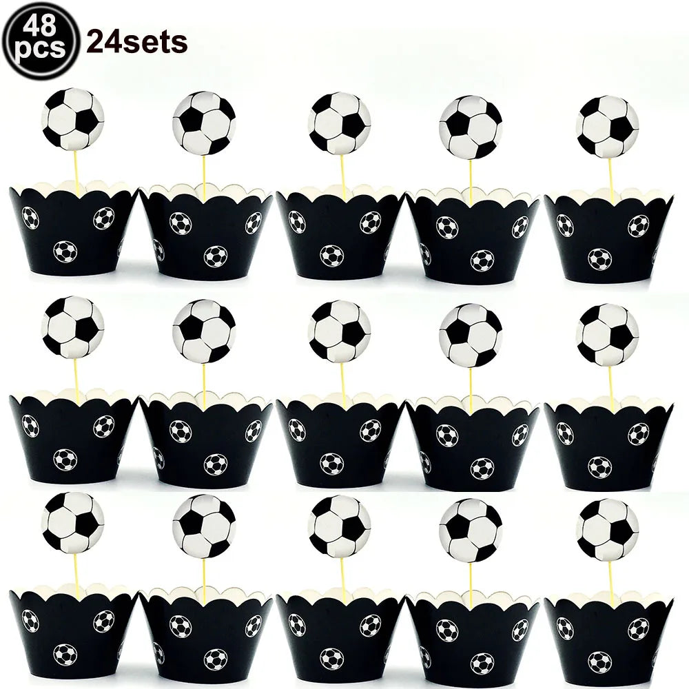 A set of 48 soccer ball cake toppers in black and white, arranged in various sizes.