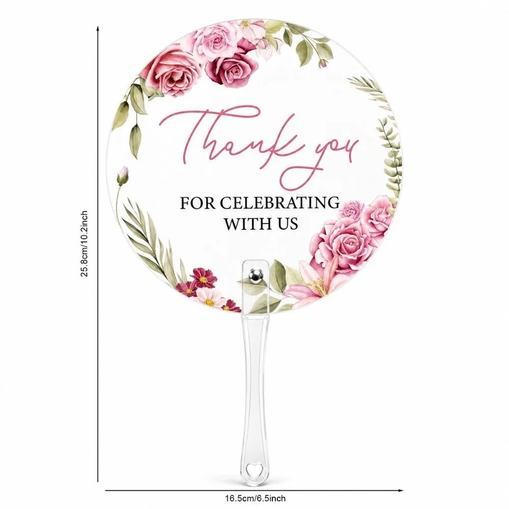 A circular pink floral thank you hand fan with the text Thank you for celebrating with us