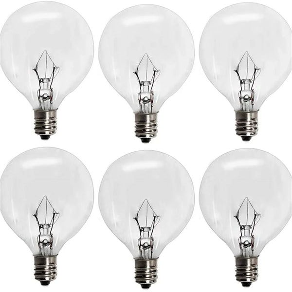 Six clear incandescent light bulbs with E12 candelabra bases shown in various angles