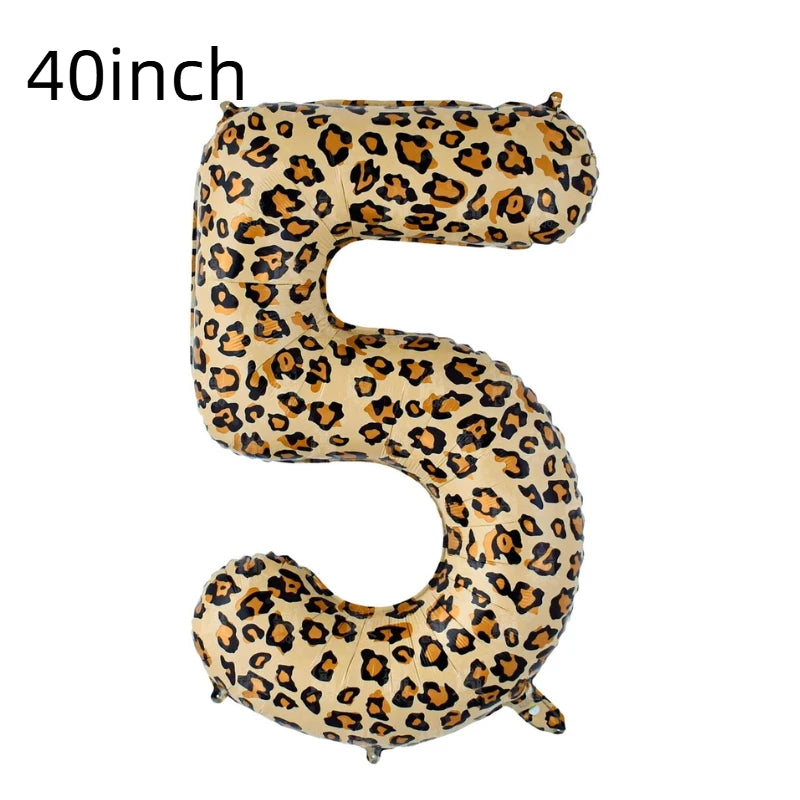 A large, inflatable number balloon shaped like the number 5 with a leopard print pattern.
