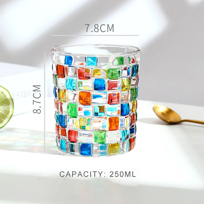 A faceted crystal whiskey glass filled with colorful, multi-colored glass pieces, showing its dimensions and capacity.