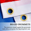 Brass grommets on a white flag fabric with blue accents for wall decor