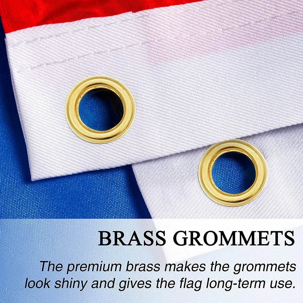 Brass grommets on a white flag fabric with blue accents for wall decor