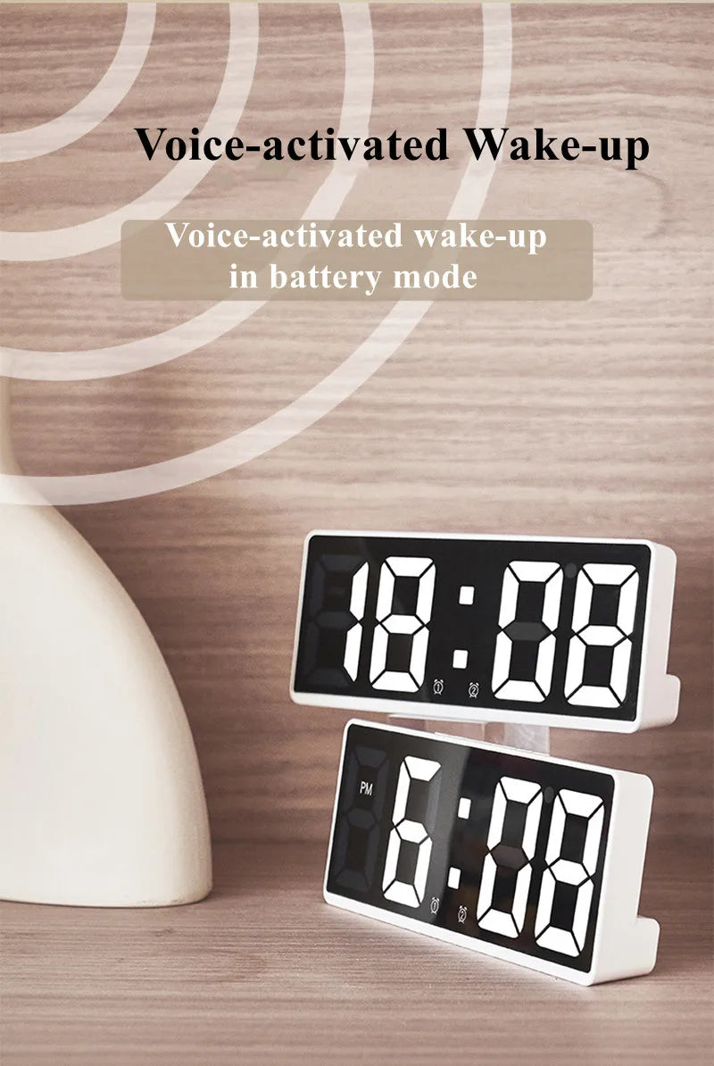 A white digital alarm clock displaying 18:08 and 6:08, shown in a close-up on a wooden surface.