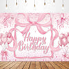 A pink backdrop banner featuring a large bow and the text Happy Birthday surrounded by pink confetti and balloons.