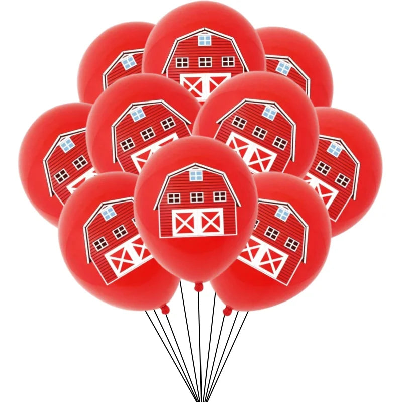 A bunch of red latex balloons shaped like farm houses with white trim and windows.