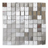 A grid of square metallic panels in silver and gold tones used as a wall backdrop.