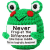 A bright green crochet frog ornament with large eyes and red accents.