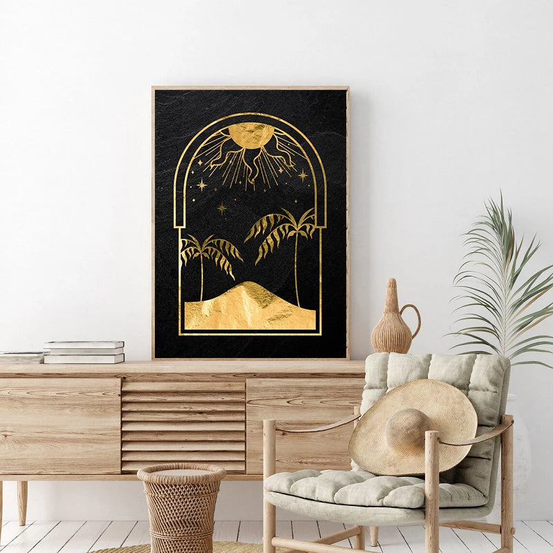 A framed canvas print featuring a golden sun and moon design on a black background.
