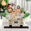 A wooden jungle animal party ornament featuring various cute animals like a lion, tiger, elephant, and a jeep.