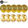 Ein Set von 10 Goldfolieballons mit Gepardmuster und Fransen.
